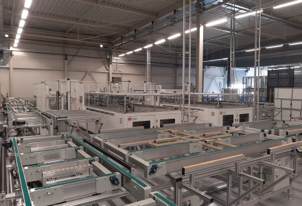 Wide-angle interior view of Brite Solar’s new factory, showcasing the scale and structure of the agrivoltaic panel production line.